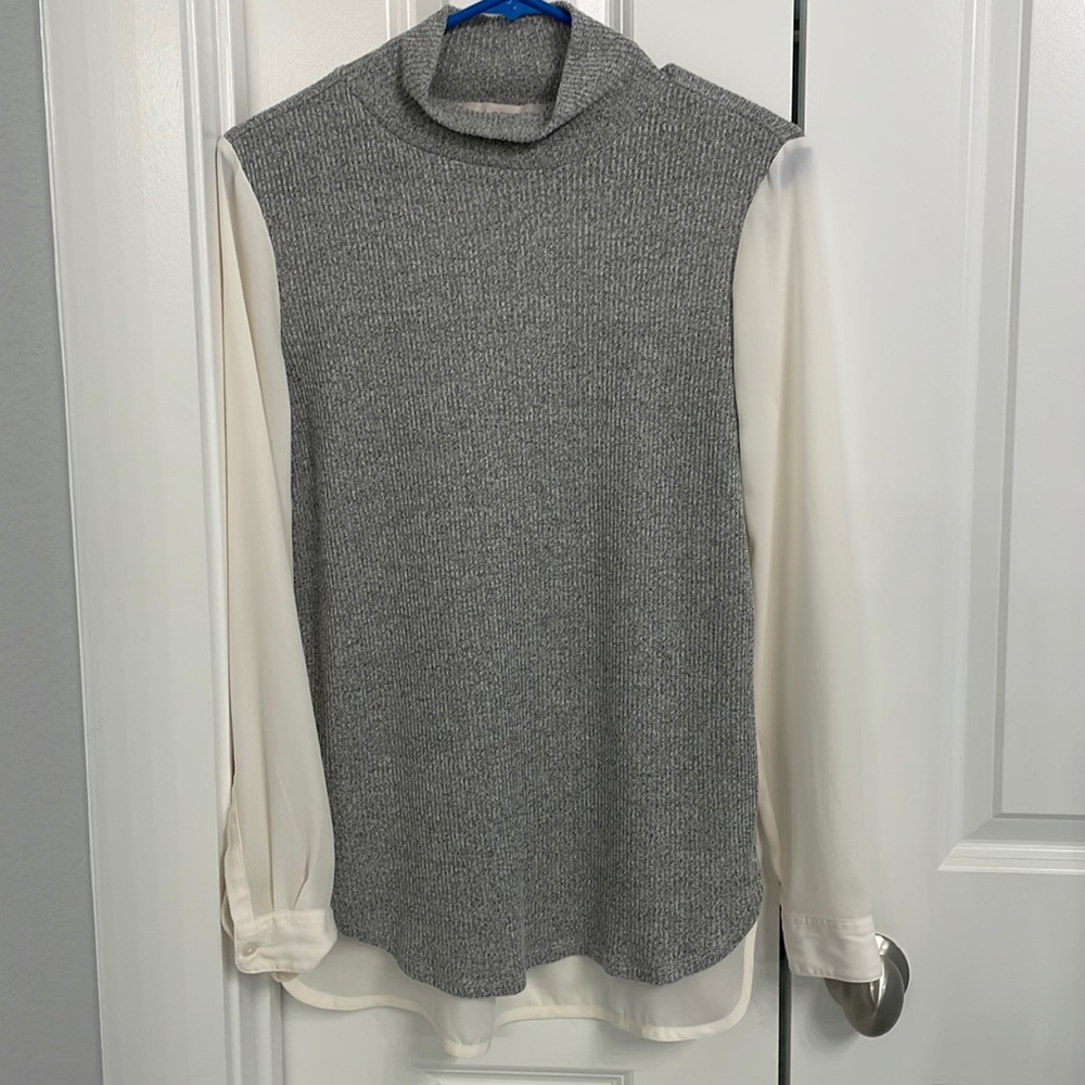 Loft Size XS Blouse. Knit front and polyester sleeves and back.